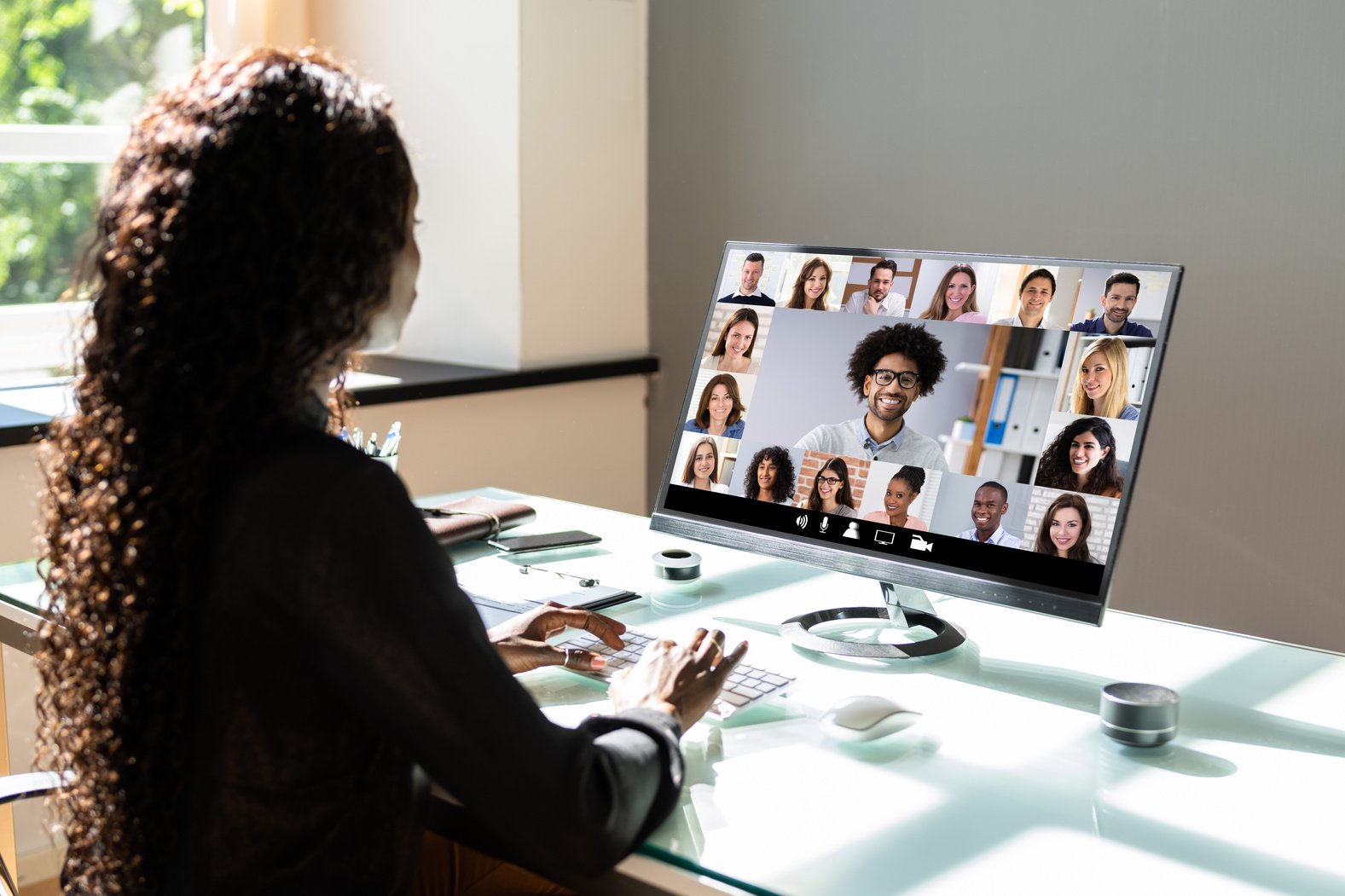 African American Watching Video Conference Webinar